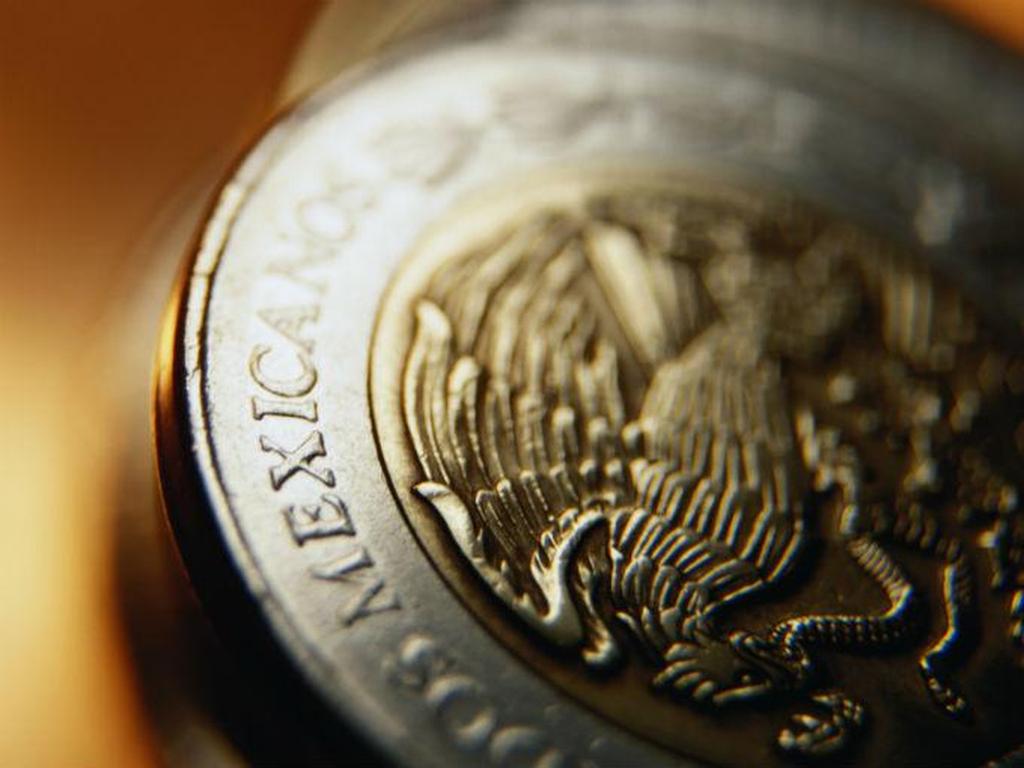 El anterior nivel más débil del peso mexicano era el de 15.669 unidades por divisa estadounidense. Foto: Photos.com
