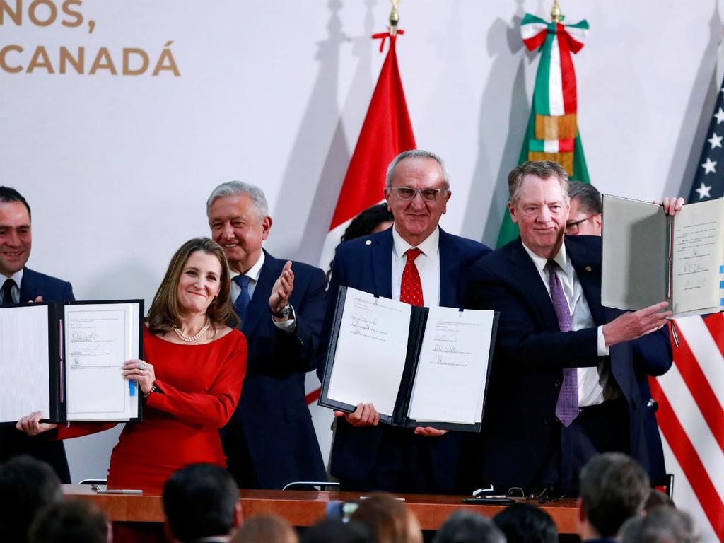 En el Palacio Nacional se llevó a cabo la firma del Protocolo Modificatorio del acuerdo comercial entre México, Canadá y Estados Unidos. Foto: Reuters 