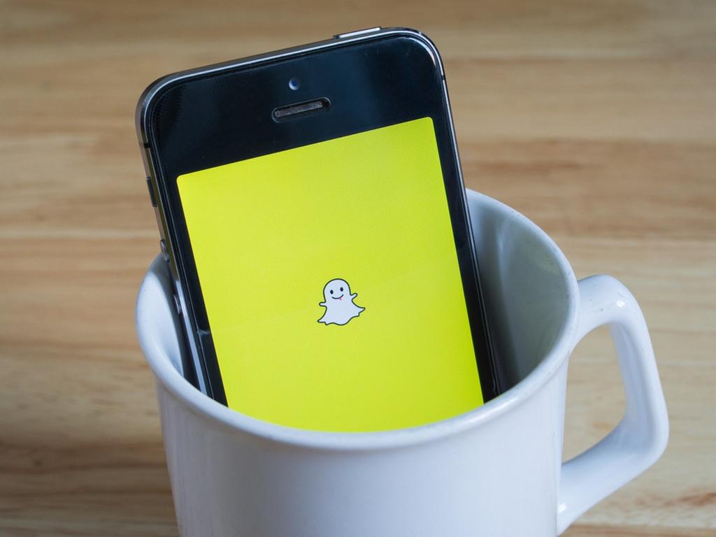 Aplicación de Snapchat en celular con tasa