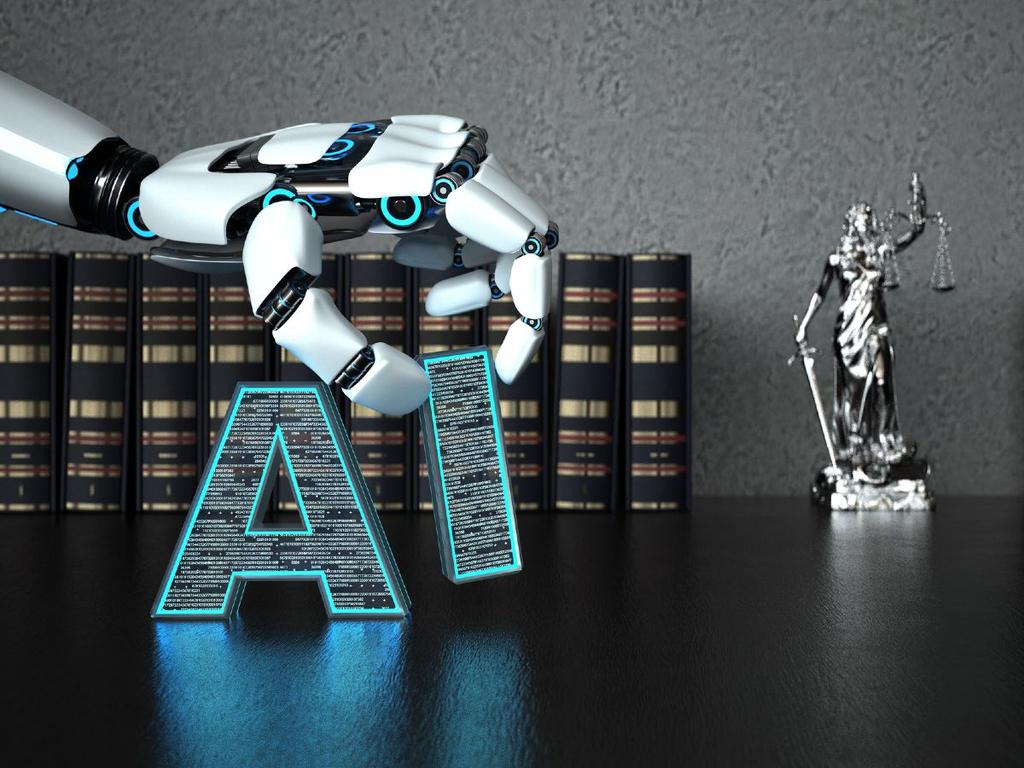 Mano de robot colocando letras AI con libros y una figura de Lady Justice 
