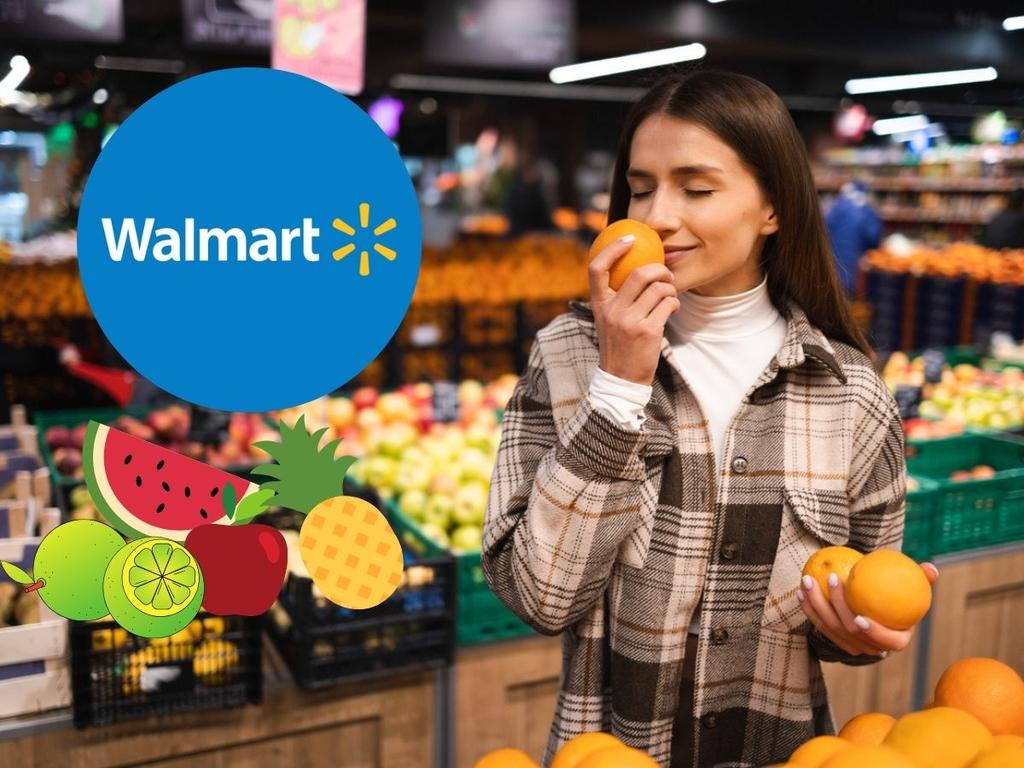 Mujer en supermercado oliendo una naranja de martes de frescura