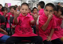 Niños de Tepito toman clases de chino-mandarín y robótica. Especial