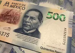 Evita ser víctima de los falsificadores, te contamos cómo identificar y qué hacer en caso de recibir un billete falso de 500 pesos. Foto: iStock