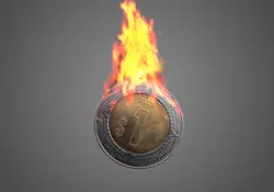 Una moneda de 1 peso con fuego en la orilla. 