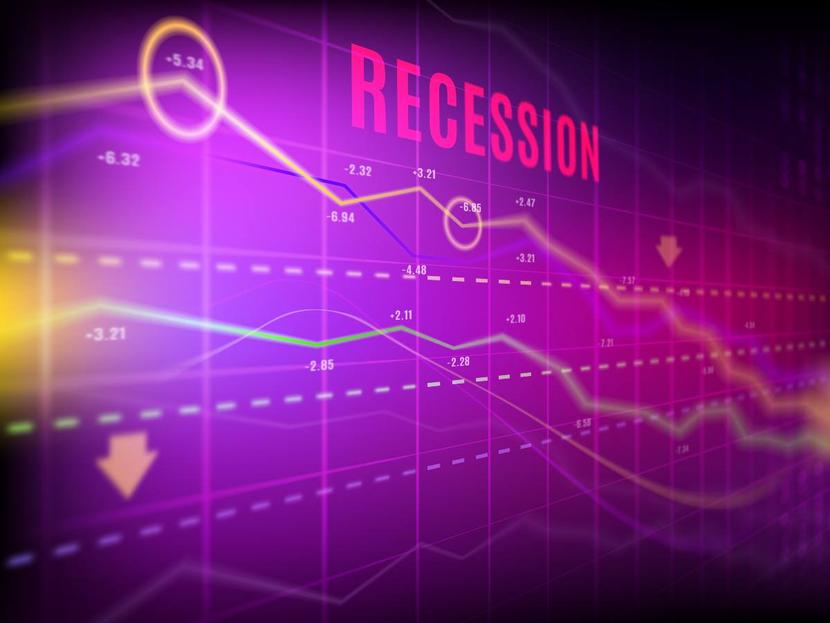 Palabra recesión en inglés sobre gráfica bursátil 